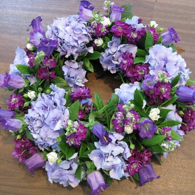 Mauve Lilac round funeral Wreath