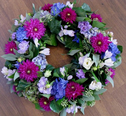 Mauve Lilac round funeral Wreath