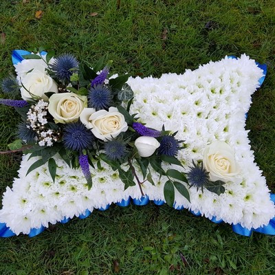 blue and white funeral pillow