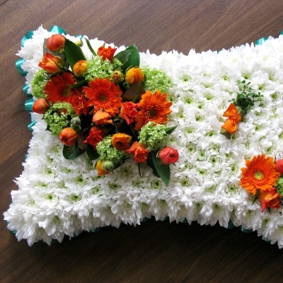 orange green white funeral pillow