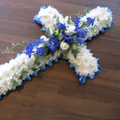 blue and white based funeral cross