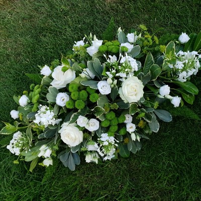 white and green funeral oasis spray