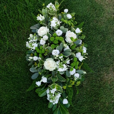 white and green funeral oasis spray