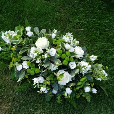 white and green funeral oasis spray