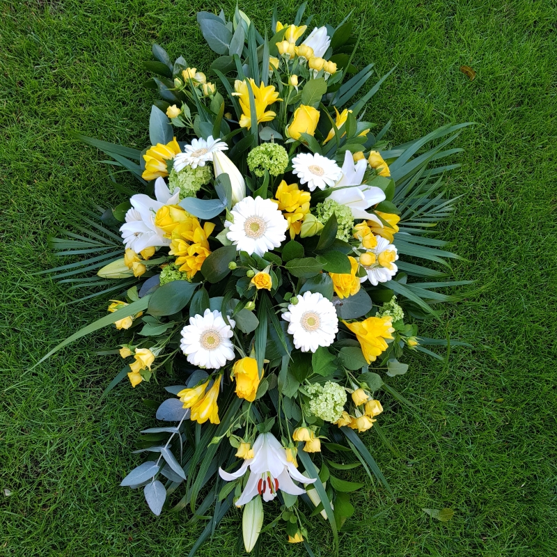yellow and white funeral oasis spray