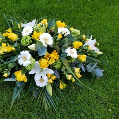 yellow and white funeral oasis spray