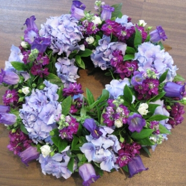 Mauve Lilac round funeral Wreath