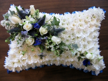blue and white funeral pillow