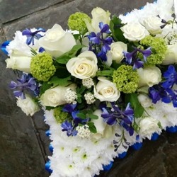 blue and white funeral pillow