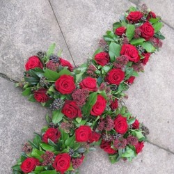 loose red rose cross