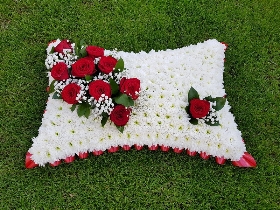 red and white pillow