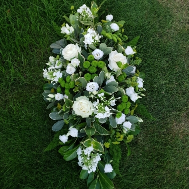 white and green funeral oasis spray