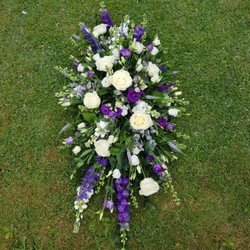 Purple and white coffin spray