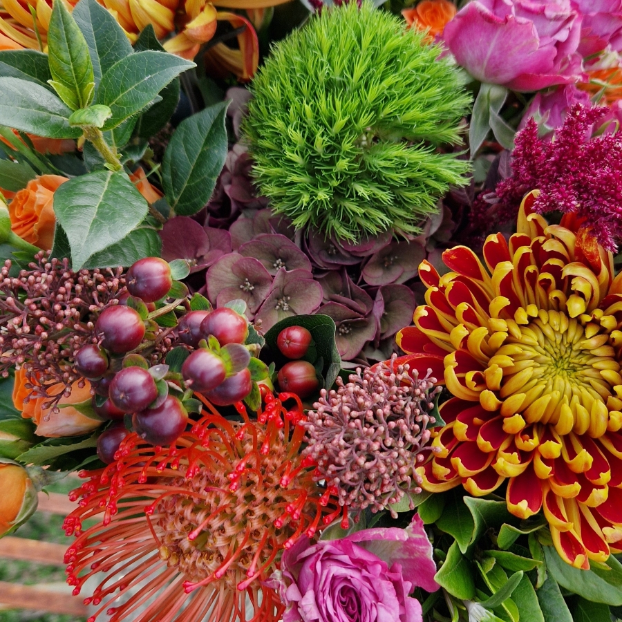 Autumn bouquet with chrysanthemum blooms, roses, and rich seasonal foliage, inspired by the South Downs
