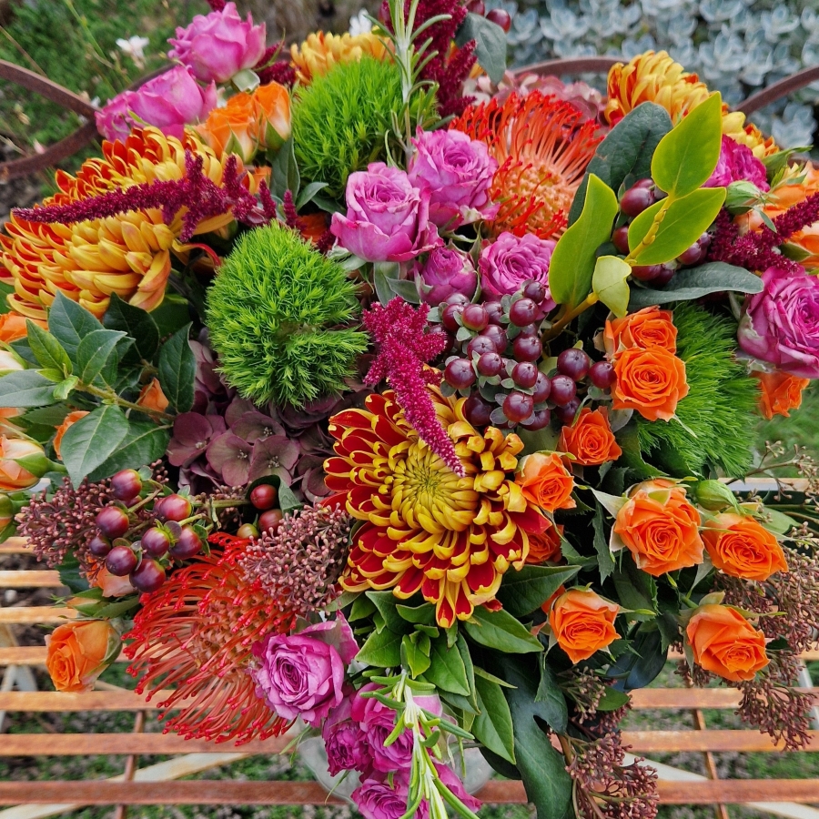 Autumn bouquet with chrysanthemum blooms, roses, and rich seasonal foliage, inspired by the South Downs