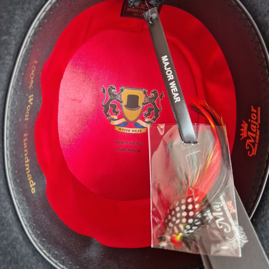 Black top hat with steampunk goggles