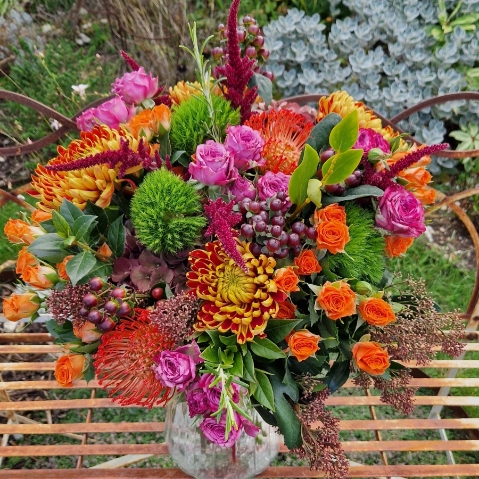 Autumn bouquet with chrysanthemum blooms, roses, and rich seasonal foliage, inspired by the South Downs