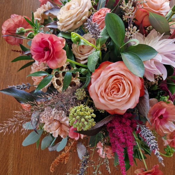 Berwick in Autumn bouquet with Kahala roses, berries and grasses in soft seasonal tones