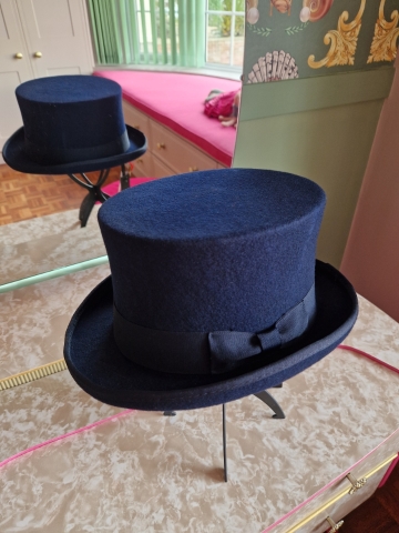 Navy wool top hat with structured crown and detachable faux flowers, or Goggles ideal for weddings or steampunk events.